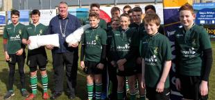 Picture are Under 14 members of Hayle RFC handing two Goal Nets to Graham Coad. These will shortly be fitted to the Goalposts in Hayle Park